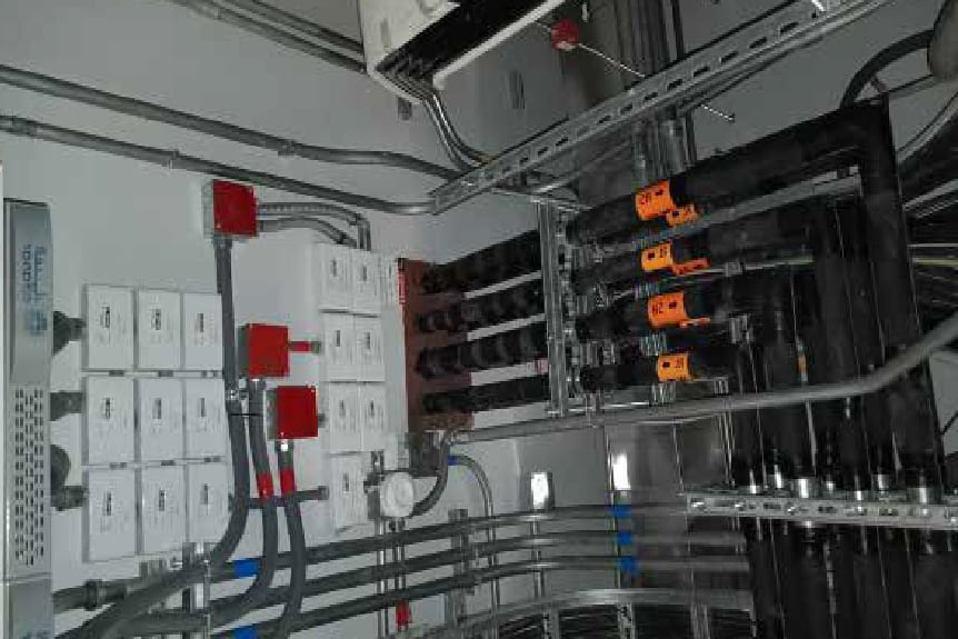 Electrical distribution panels and cable containment