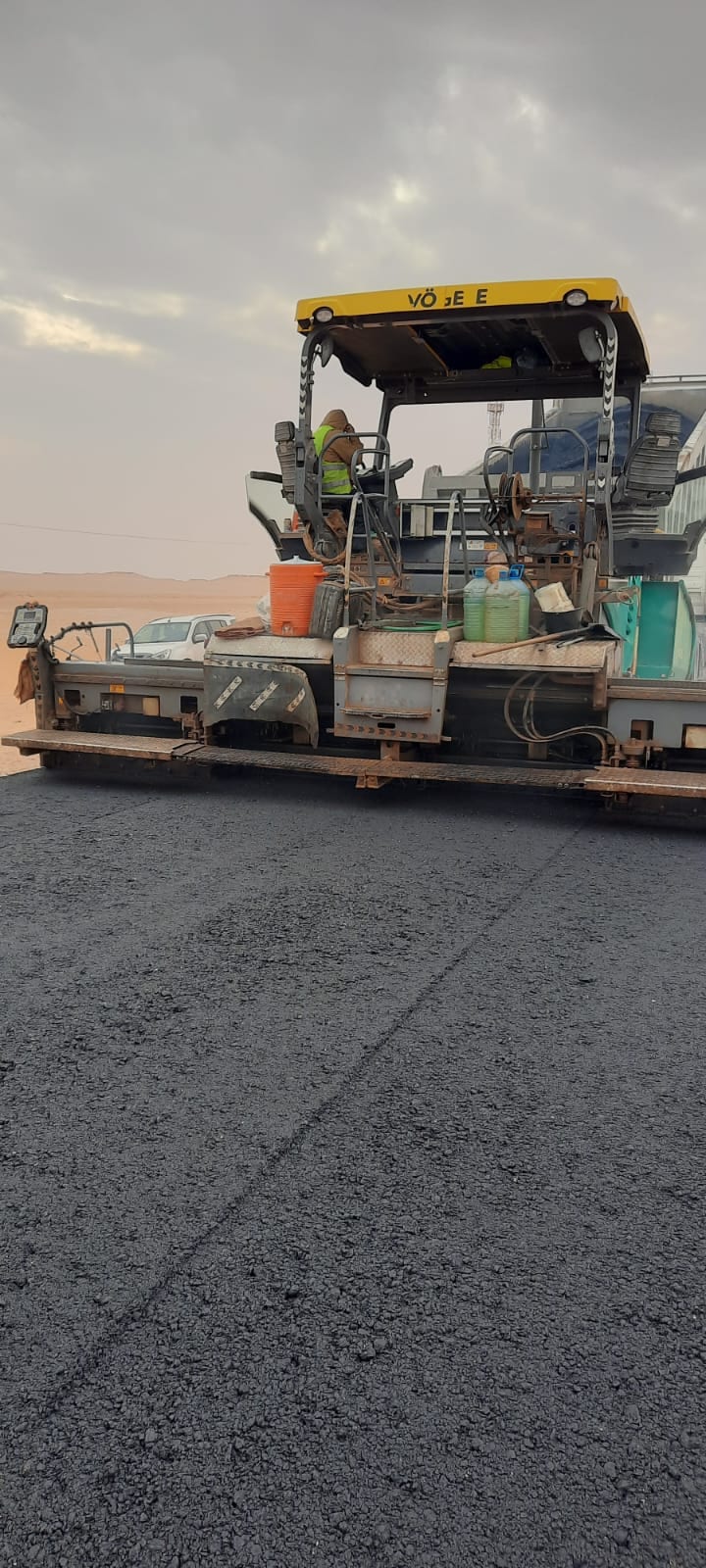 Road paving plant and machinery on site