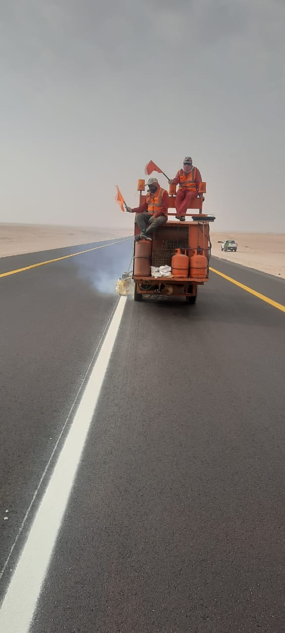 Completed asphalt road surface with lane markings